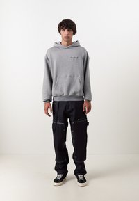 Don't Waste Culture KAJAL UNISEX - Calças de ganga folgadas - raw denim dark blue