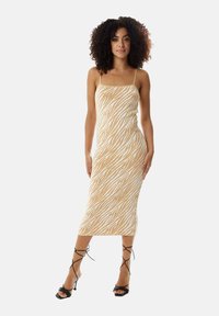Zebra print midi dress in beige and cream, featuring spaghetti straps and a fitted design. Smooth texture with a subtle sheen.