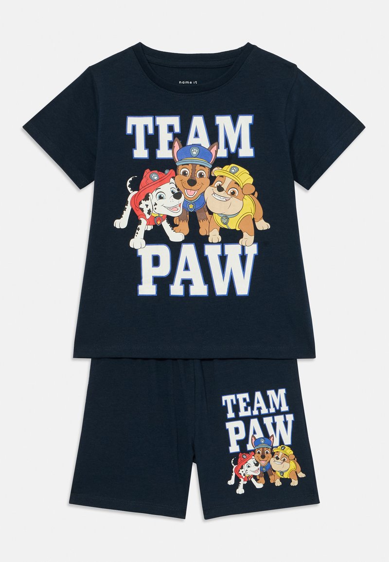 Navy blue cotton pajama set featuring cartoon dogs and "TEAM PAW" text. Short-sleeve top and shorts with elastic waistband.
