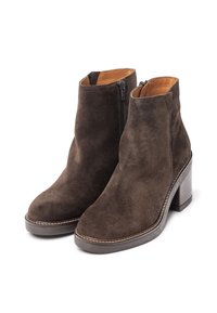 Brown suede ankle boots with a high block heel, decorative stitching, and a side zipper for easy wear. Smooth interior lining.