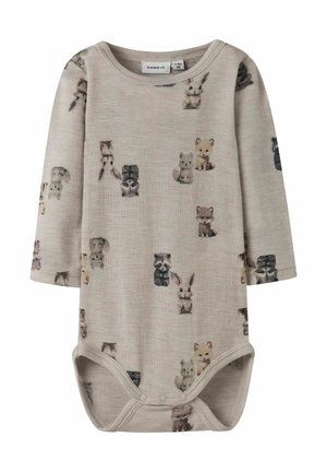 Langärmliger Babybody aus weichem beigen Stoff mit Tiermotiven. Verfügt über einen klassischen Ausschnitt und Druckknöpfe im Schritt für ein einfaches Ankleiden.