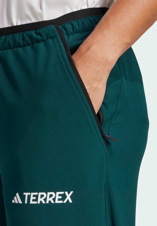 LITEFLEX - Tracksuit bottoms - aurora ivy4