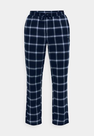 Calças de pijama azul-marinho com padrão de xadrez branco, cintura elástica, cordão ajustável e detalhe de bolso. Tecido macio e corte descontraído.