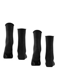 Black socks made of a smooth, stretchy material, featuring a ribbed cuff and minimalist design. Accented with small white text at the heel.