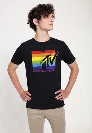 Black cotton t-shirt featuring a multicolored MTV logo with red, yellow, green, and blue stripes and the text "MUSIC TELEVISION" in purple.