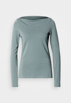 Langærmet skjorte i blødt, lyseblåt-grønt stof med bådudskæring og en figursyet pasform med rene kanter.