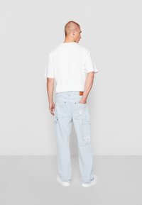 Karl Kani RETRO BAGGY WORKWEAR - Blugi loose fit - bleached blue