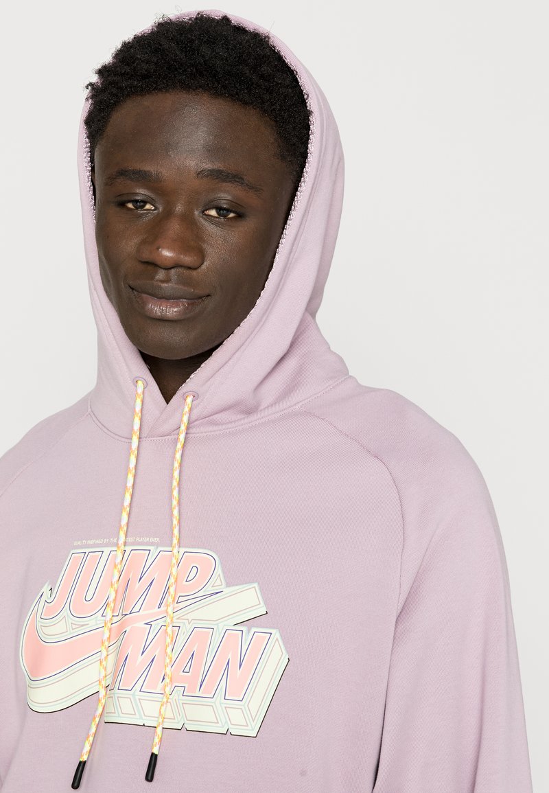 brown hoodie with pink writing