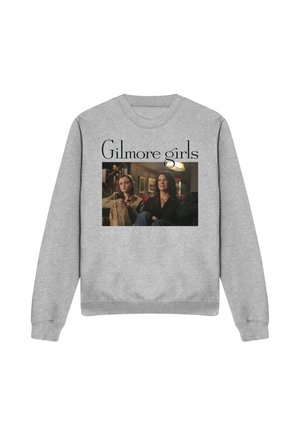 Gray sweatshirt with "Gilmore girls" text above a photo of two women sitting on a couch in a cozy, dimly lit room.