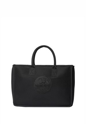 Sac cabas noir Marc Ellis avec surface texturée et deux petites poignées, arborant un logo rond embossé sur le devant.