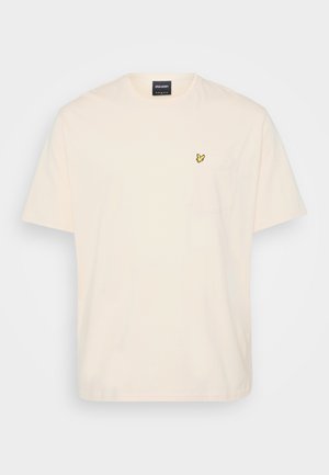 Heledad beez T-särk lühikeste varrukatega, mis on valmistatud puuvillast. Rinnataskul on väike kollane liblikas logo. Tavaline ümmargune kaelus.