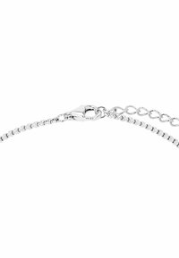 Pulsera de cadena de plata con cierre de langosta, que presenta eslabones finos y una cadena de extensión ajustable para un ajuste personalizable.