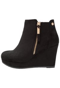 XTI Ankle boot