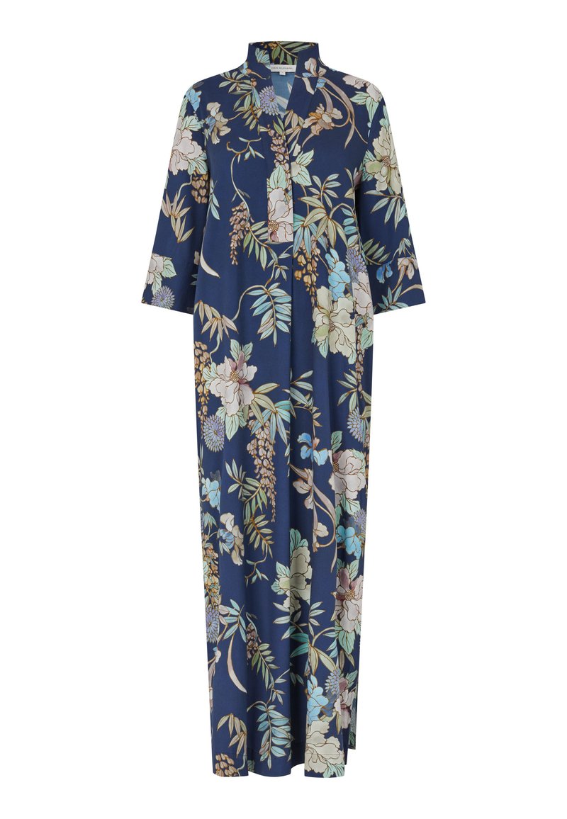 Abito maxi floreale con sfondo blu navy, caratterizzato da fiori verdi e pastello, maniche lunghe e una vestibilità ampia.