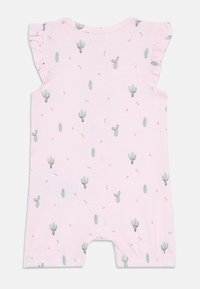 Combinaison rose clair avec des manches volantées, ornée d'un motif de cactus et de petites fleurs en vert et jaune. Tissu en mélange de coton doux.