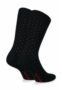 Czarne skarpetki z małymi czerwonymi kropeczkami, wykonane z miękkiego materiału. Posiadają ściągacze i logo "PROCHIV" w czerwonym kolorze na podeszwie.