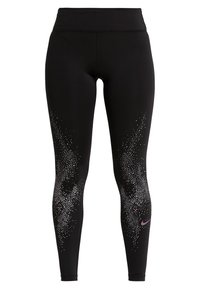 Svarta leggings i töjbart tyg, med hög midja och ett gradientmönster av små vita prickar nära underbenet, med en lila logotyp.