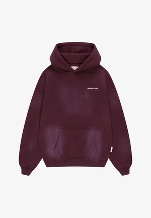 Marooni kapuutsiga dressipluus esitasku ja vasakul rinnal väike valge kiri "ANOTHER COTTON".