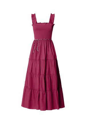 Abito lungo senza maniche rosa scuro con corpetto arricciato, spalline arricciate, gonna a balze e sottile cintura di corda annodata in vita.