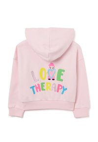 Sudadera corta rosa con un gráfico frontal que presenta el texto "LOVE THERAPY," un personaje de dibujos animados y letras coloridas y estilizadas.