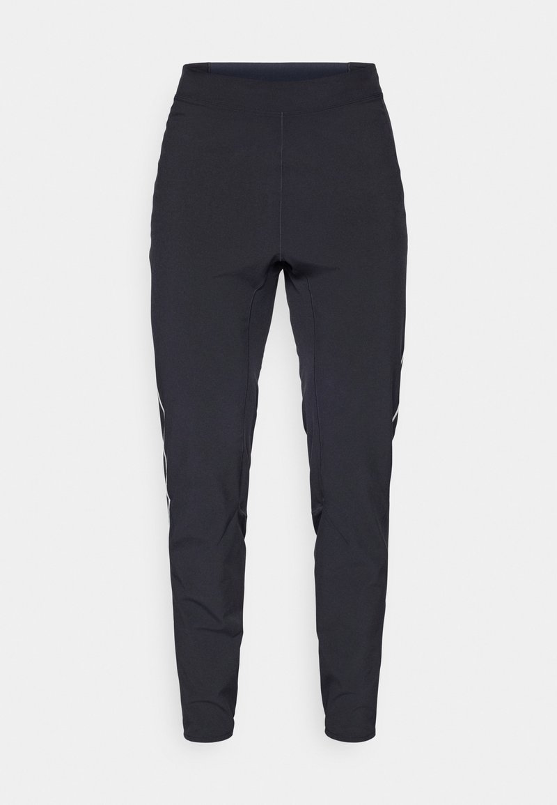 Pantalons de sport ajustés noirs avec taille haute et bandes réfléchissantes discrètes le long des jambes extérieures, présentés à plat sur un fond blanc.