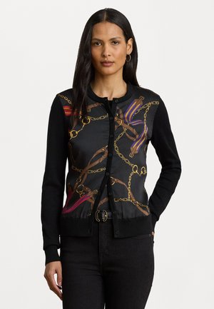 Black cardigan featuring a printed design of gold chains and colored ribbons. The front has a round neckline and button closure.