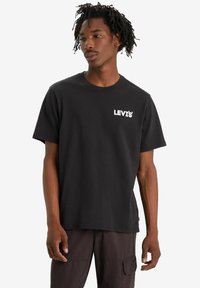 Levi's® RELAXED FIT - T-shirt print - original white