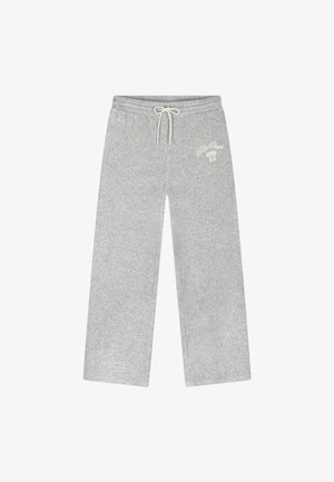 Hellgraue Sweatpants mit weitem Bein, elastischem Bund und weißem Kordelzug, kleines besticktes Logo auf dem rechten Oberschenkel und der Hüfte.