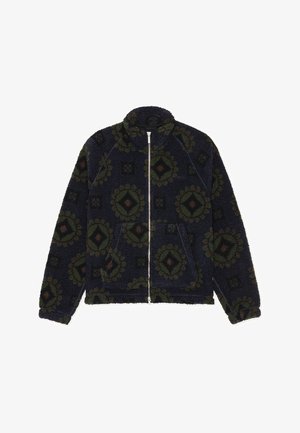 Fleece jacket in navy with a textured, patterned design featuring green and burgundy geometric shapes. Full zip and stand collar.