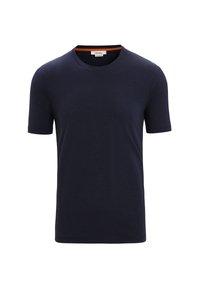 Camiseta azul marino de algodón suave, con cuello redondo y mangas cortas. Sutil acento naranja en el interior del cuello.