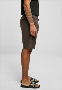 Urban Classics Tepláky - brown