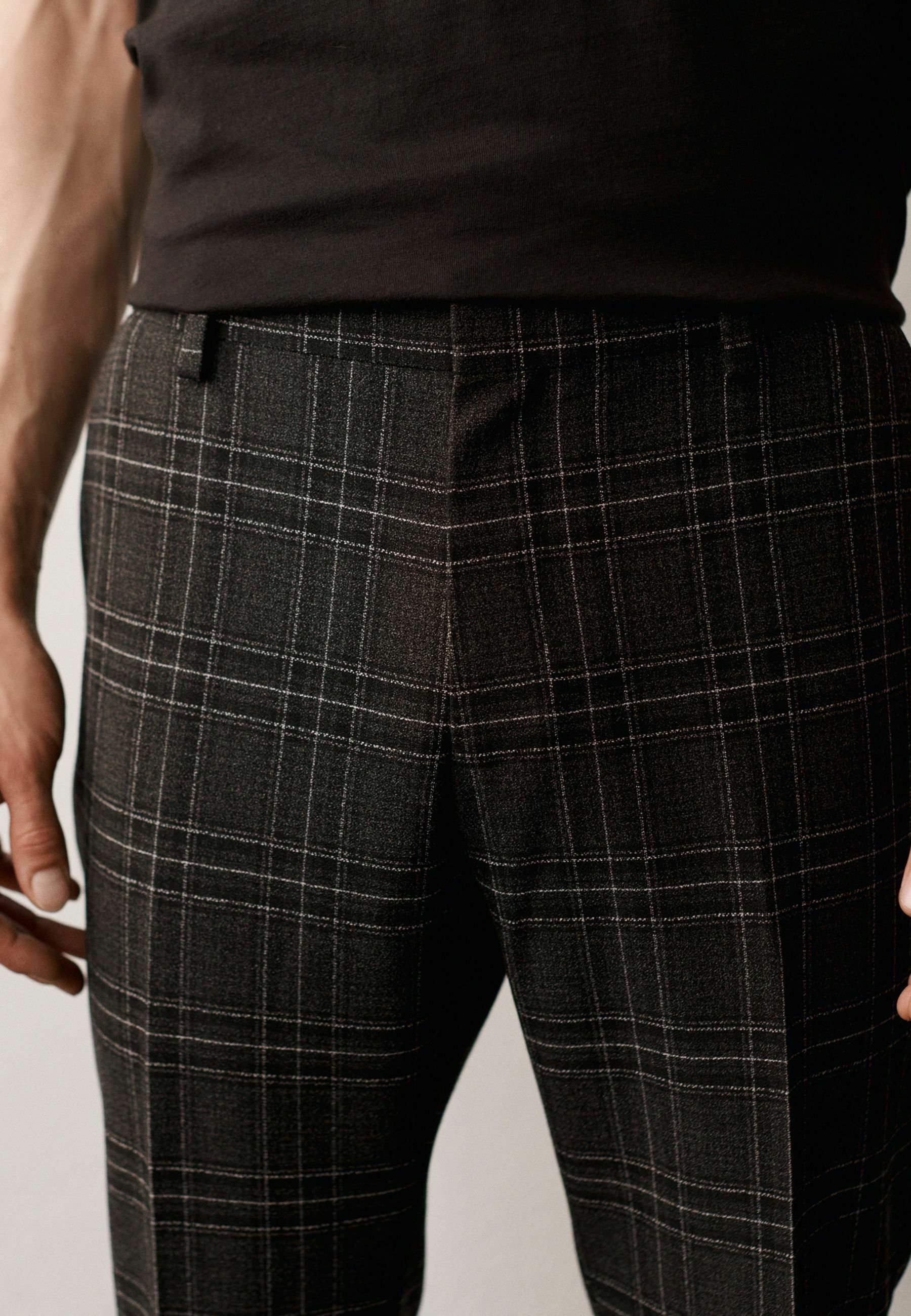 MOTION FLEX - Trousers - black 