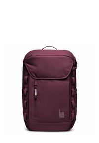 Zaino rettangolare di colore viola scuro con tasca anteriore con zip, maniglia superiore, anelli laterali e logo "GOT BAG" nell'angolo in basso a destra.