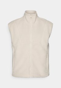 Witte fleece vest met hoge kraag, voorrits en zijzakken. Met een gestructureerde stof en mouwloos ontwerp.