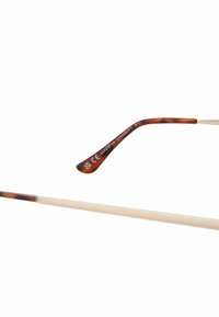 Branche de lunettes à motif écaille avec marquages UKCA et CE et texte "Made in China FC 3" sur fond blanc.