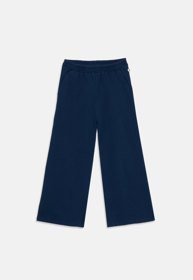 Mornarsko modri široki hlače z elastičnim pasom in stranskimi žepi, razporejene na beli podlagi.