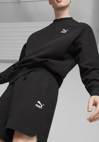 Puma CLASSICS MIT WAFFELSTRUKTUR - Træningsbukser - black