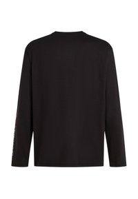 Black long-sleeve t-shirt featuring a crew neck, smooth texture, and colorful graphic print on the left sleeve.