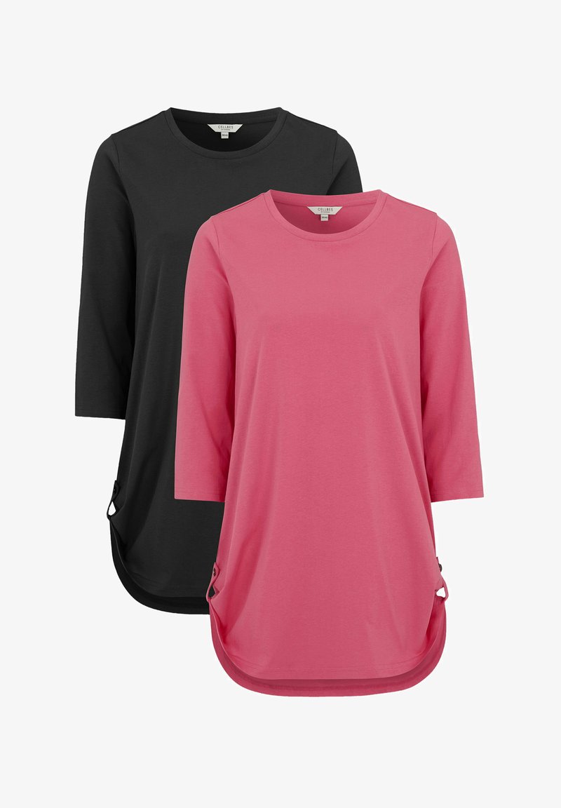 Zwei langärmlige Tunika-Oberteile: eines schwarz und eines pink. Weicher, glatter Stoff mit abgerundetem Saum und seitlichen Akzenten. Robuste Nähdetails.