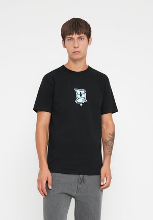 Black cotton t-shirt with short sleeves, featuring a light blue graphic logo at the center. The shirt has a relaxed fit and round neckline.
