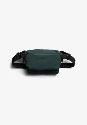 Dark green rectangular waist bag with adjustable black strap and small front zipper pocket, Bellroy logo centered on front.