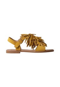 Sandale plate jaune avec bride à la cheville, boucle et franges décoratives en suédine avec de petites perles sur le dessus.