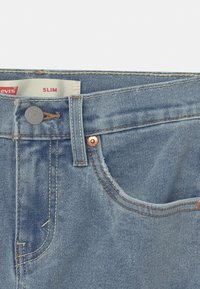 Levi's® SLIM FIT ECO FLEX - Džínové kraťasy - light-blue denim