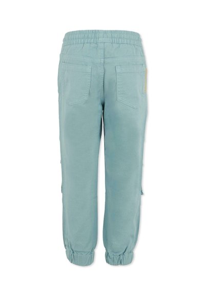 Jogging en tissu doux bleu clair avec une taille élastique, deux poches arrière et des poignets froncés aux chevilles. Design décontracté, coupe ample.