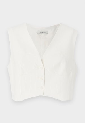 Hvit kort topp med v-hals, to frontlommer, fem knapper og vertikale teksturerte striper. Laget av et glatt, lett stoff.