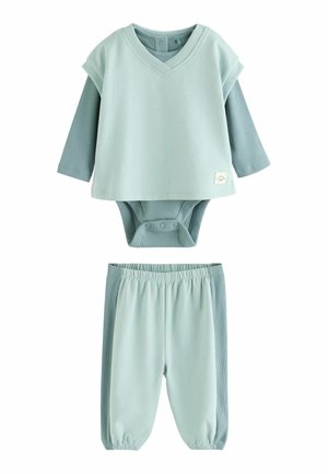 To-delt babyoutfit i lyseblå med langærmet bodystocking og matchende bukser med elastisk talje og manchetter ved anklerne.