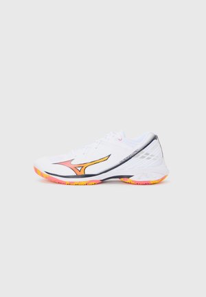 White athletic shoe featuring a black and orange side logo, textured mesh upper, pink-yellow sole, and contrasting black accent strip.