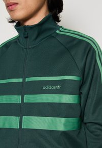 adidas Originals FIRST - Träningsjacka - mineral green
