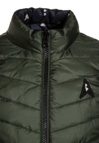 Olive green puffer jacket with a high collar, featuring a central zipper and black hardware. Includes a triangular logo on the chest.