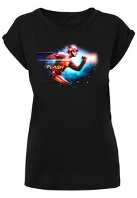Black t-shirt featuring a vibrant graphic of a character running, with motion lines and "FLASH" text incorporated in the design.